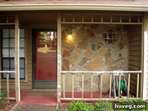Close-up of freshly painted house exterior showcasing the warm Basketry siding color and crisp Rustic Cream trim.