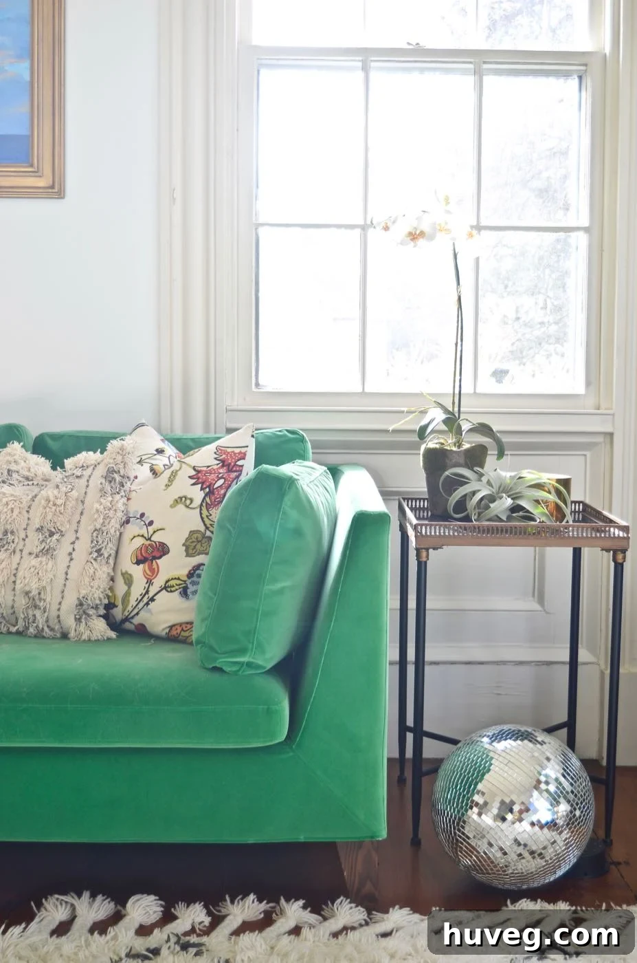 Charlotte's green velvet couch