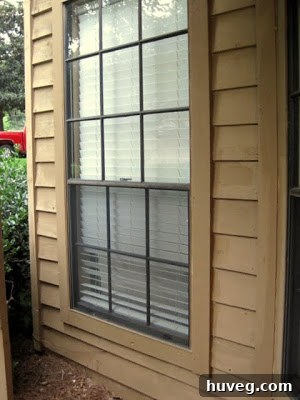 Another angle of exterior detail work, possibly on a porch or entryway, showing completed renovation