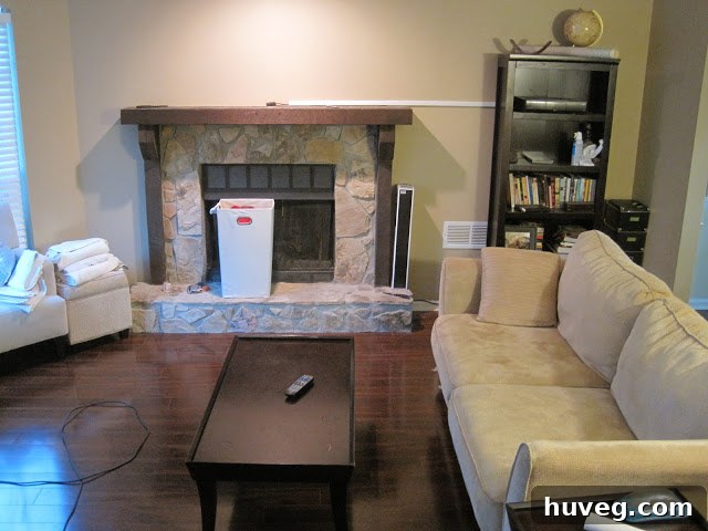 A living room missing a characteristic recliner and television set, indicating significant changes in home setup.