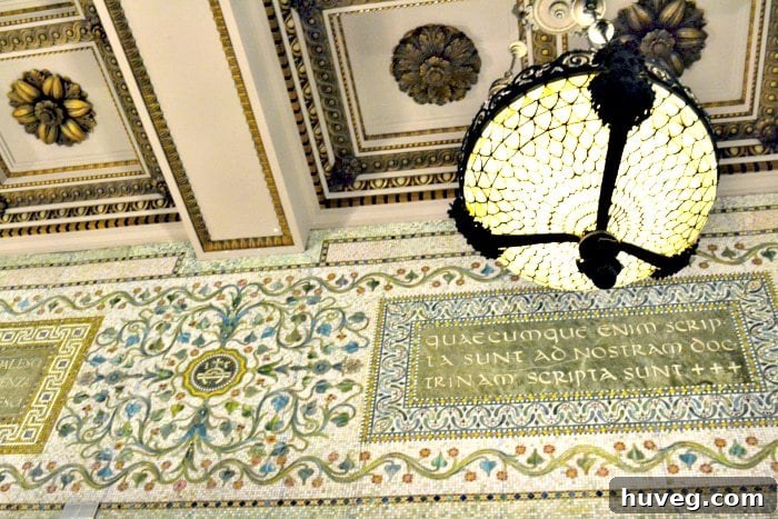 Ornate, intricate ceiling designs and architectural details inside the Chicago Cultural Center, featuring domes and decorative elements.