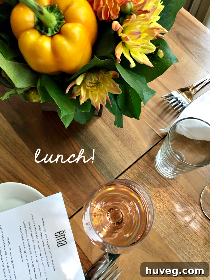 A table filled with an assortment of fresh and colorful Mediterranean small plates for lunch at Ema Chicago.