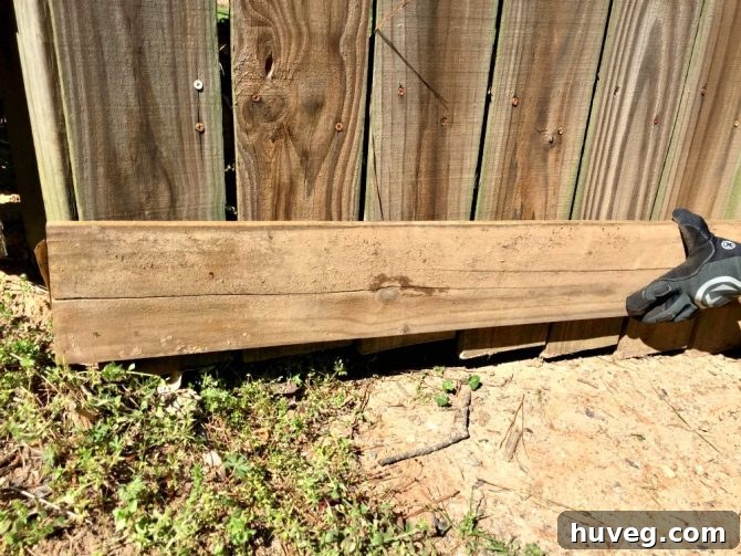 Fence - Use spare board to create straight line to keep gate from scraping on the ground