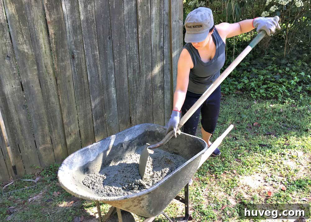Continuous concrete mixing in a wheelbarrow for the cement slab