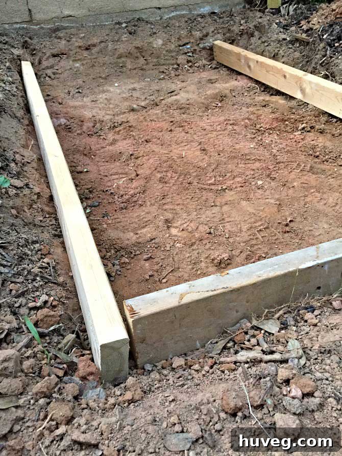 2x4 frame for concrete slab placed next to the house