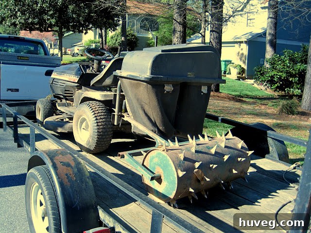 Close-up of a tow-behind aerator’s spikes