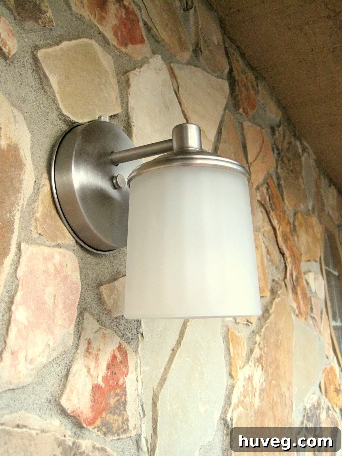 Close-up of the new outdoor light, showcasing its design and the quality of light it emits.