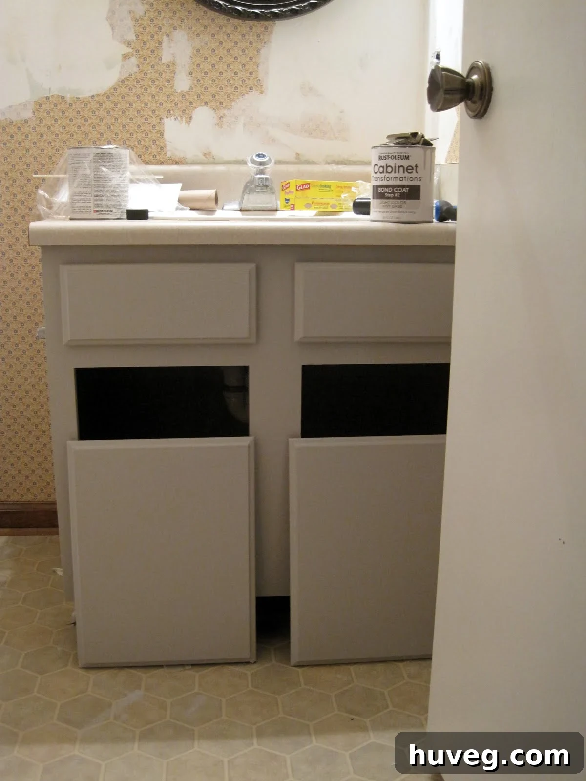 After image of the transformed bathroom cabinet with new paint and finish