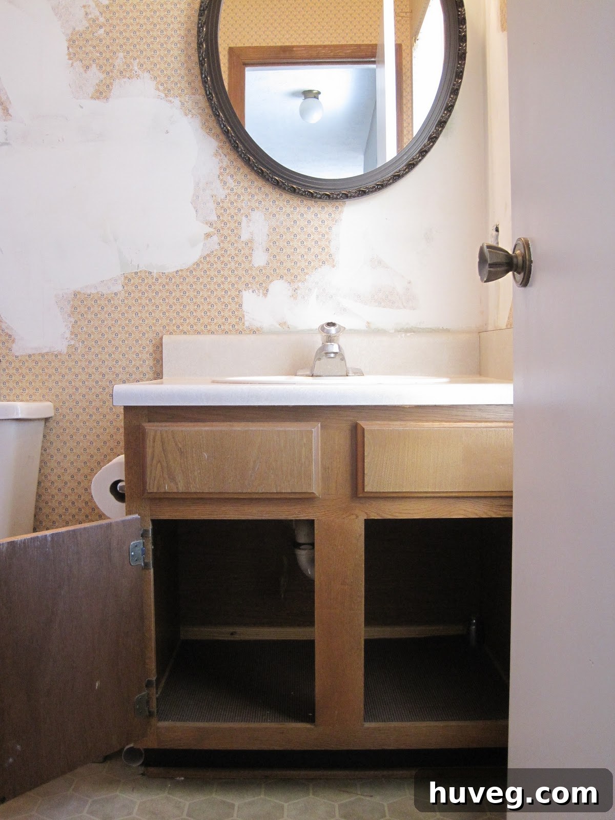 Before image of the old bathroom cabinet