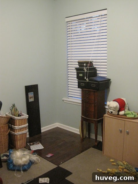 After image showcasing a beautifully organized and minimalist craft room, with neatly arranged supplies in clear containers, ample workspace, and a calming aesthetic.