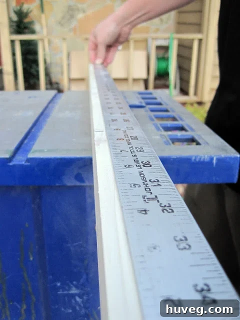 Measuring wood plank for dog bowl stand legs