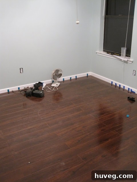 Newly installed DIY flooring in the craft room