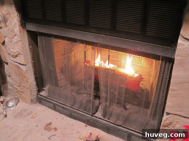 The fireplace with a roaring fire, finally in use.