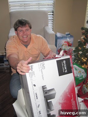Joyful man with a speaker system