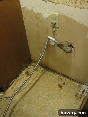 Image of the old, messy kitchen floor before renovation