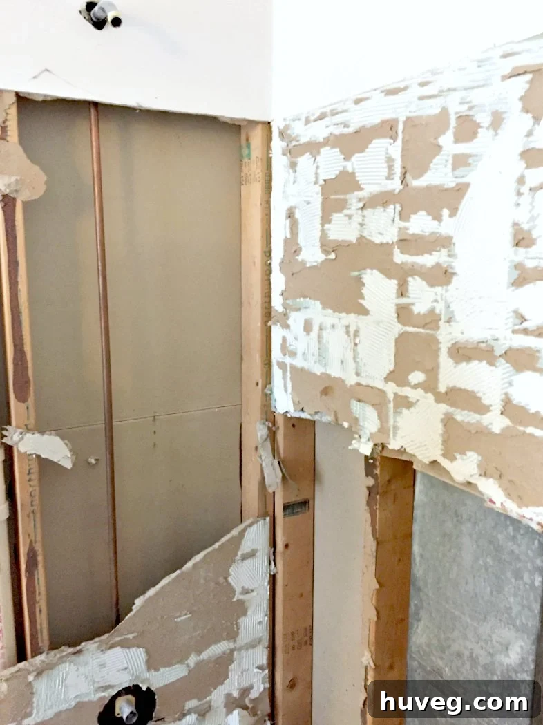 revealing studs under drywall