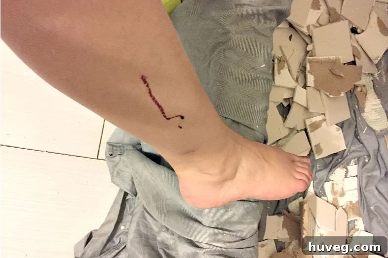 diy injury - small cut from removing tile