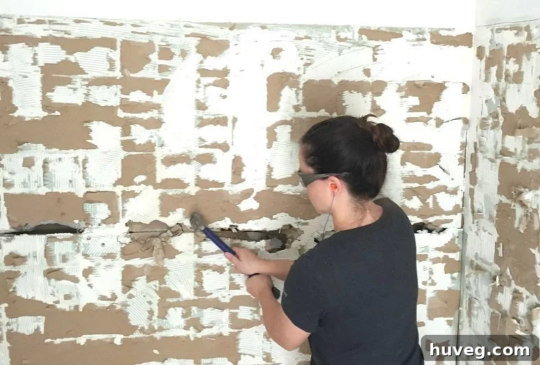 knocking through old drywall