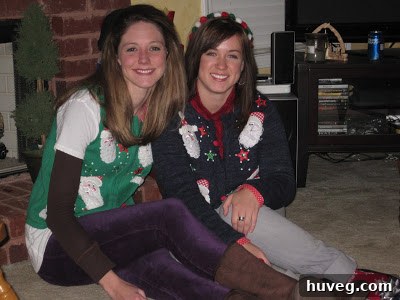 A group of friends laughing and posing together at the tacky Christmas sweater party, highlighting the joyous and communal atmosphere.