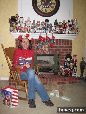 A friend animatedly reading a dramatic passage from a Christmas-themed romance novel during the party, much to the amusement of the onlookers.
