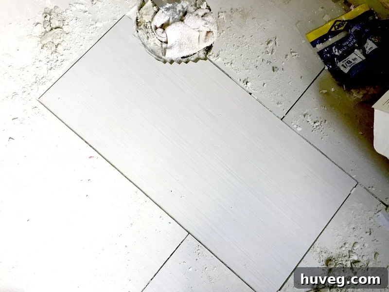 Replace porcelain floor tile in master bath