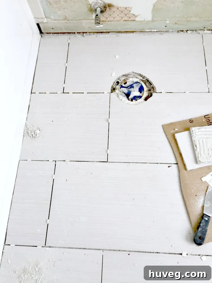 Correcting as much as possible in master bath tile floor