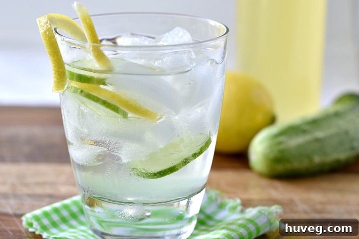 Close-up of a Limoncello Cucumber Cooler in a glass