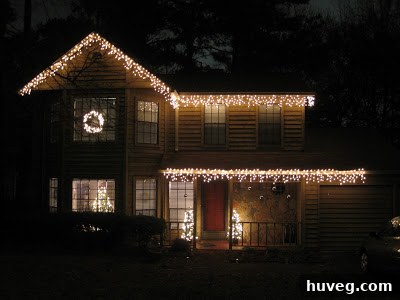 Our home exterior fully illuminated with festive Christmas lights