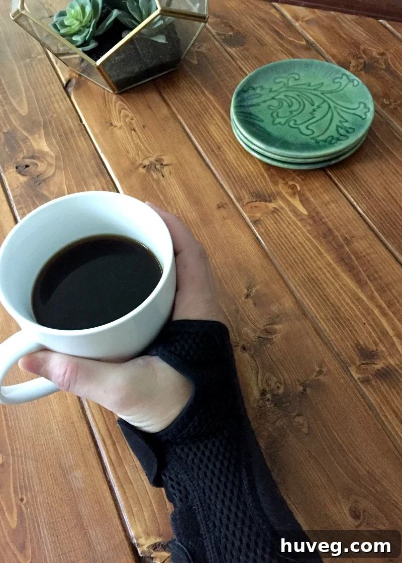 Wrist brace for carpal tunnel on a coffee table, highlighting post-DIY recovery