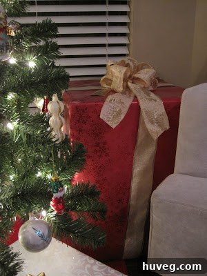 A large, mystery gift wrapped in brown paper