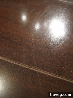 Multiple light scratches visible on hardwood floor surface