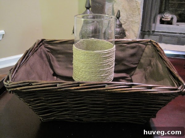 Dollar store candle holder wrapped with twine for a rustic Thanksgiving centerpiece