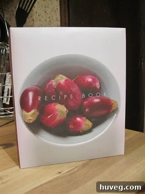 An open handwritten family recipe book, showcasing generational traditions