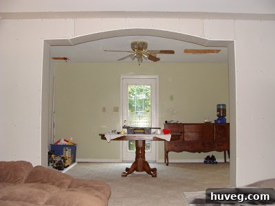 Work in progress on a living room remodel with a newly framed archway.