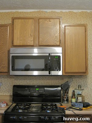 Above-the-range microwave installed