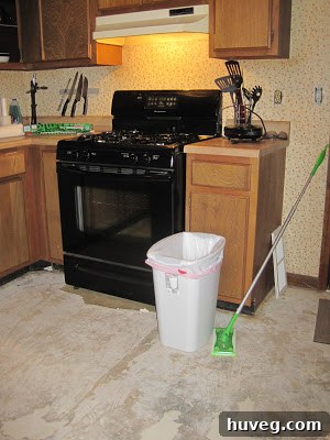 Partially renovated kitchen showing temporary disorganization
