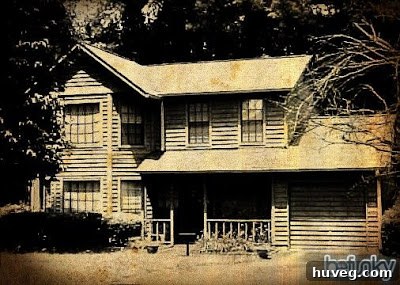 The house photo with an aged or vintage photo effect, featuring sepia tones and simulated damage.
