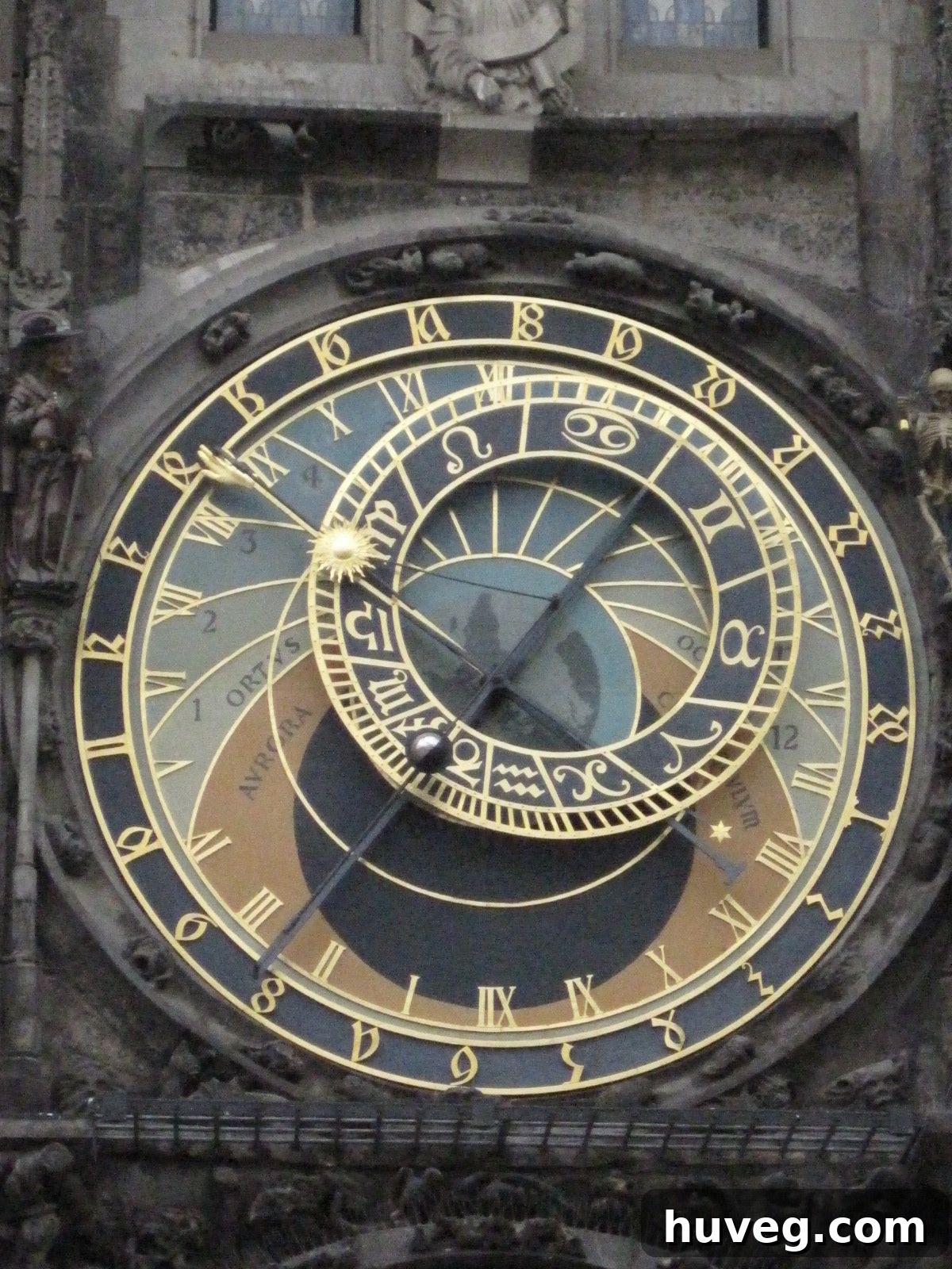 The intricately designed and world-famous Astronomical Clock in Prague's bustling Old Town Square, a marvel of medieval engineering and artistry.
