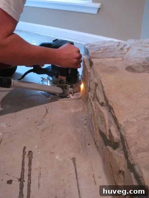 Sparks flying during the initial attempt to cut the fireplace stone