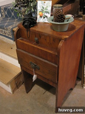 A small, vintage two-drawer table, ideal for an entryway.