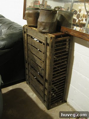 An old, mysterious wooden crate with old pots on top.