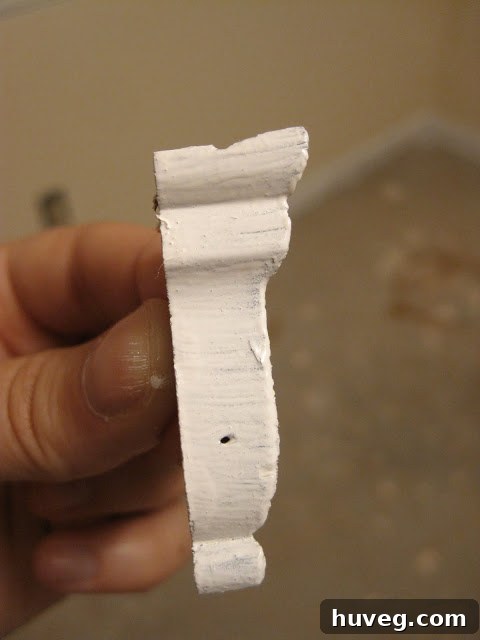 A small piece of detached trim ready for painting