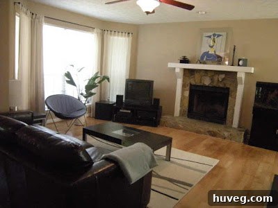 Stone fireplace with a painted white mantel