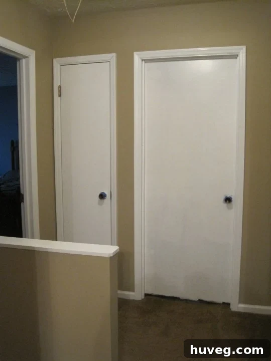 Upstairs Hallway Before Paint and Flooring Renovation