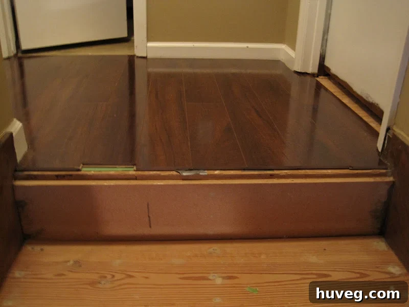 Stair Nosing Area Connecting Hallway Laminate to Stairs