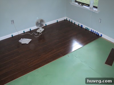 Newly installed Brazilian Walnut flooring in a craft room