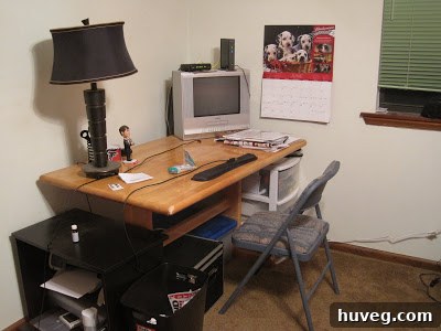 Scott's makeshift desk in the guest bedroom, an old dining table
