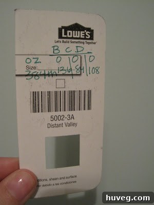 Paint chip marked with a color code for precise matching