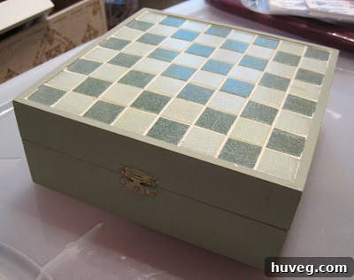 Small wooden craft box with a tiled top