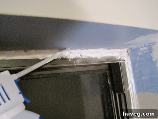 Applying expanding foam into a large window gap